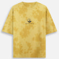 Front view of the Zenrola Zence tie-dye t-shirt in yellow with centered brand logo